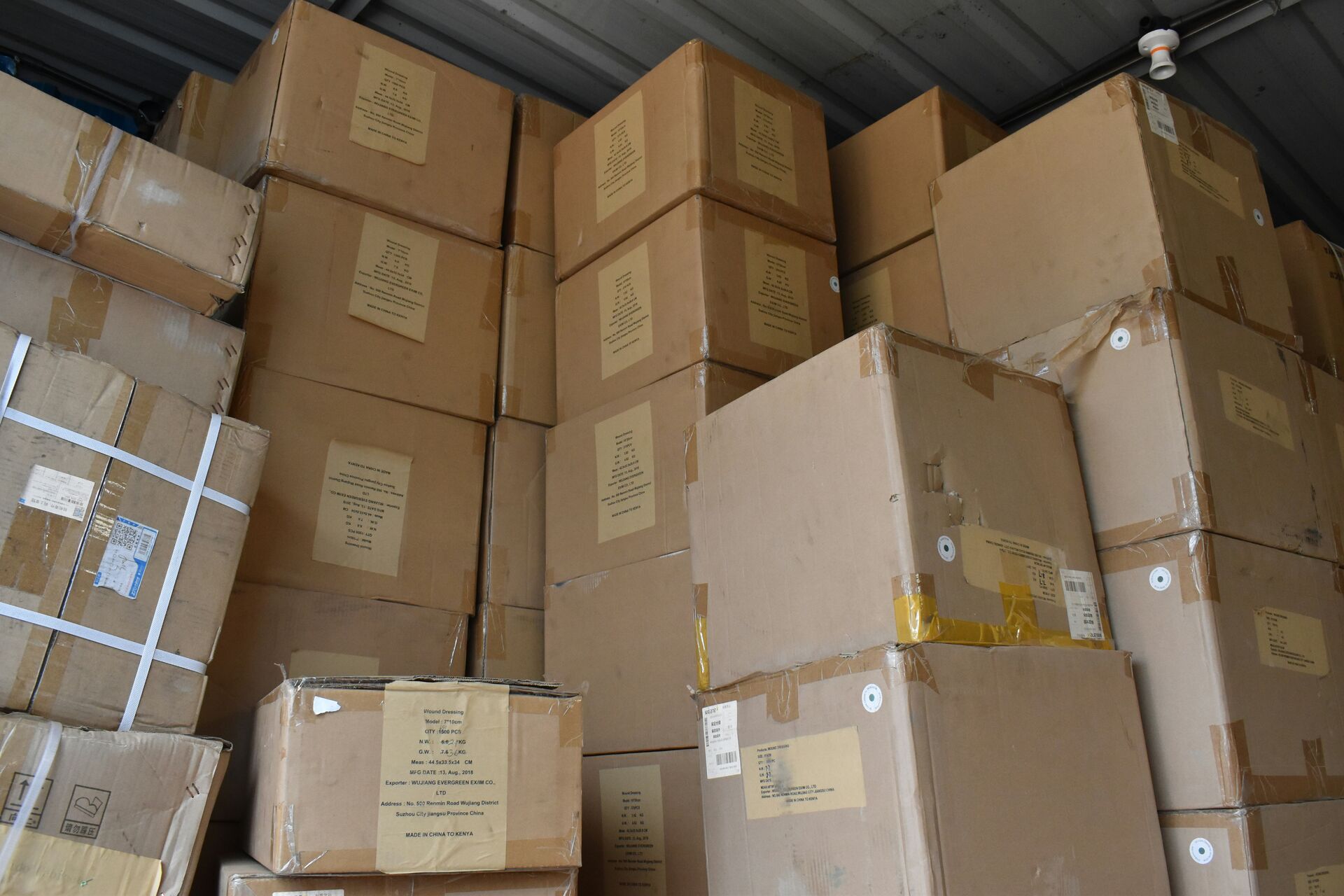 Stacks of private-label retail boxes ready for bulk shipment.